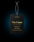 Black tag with gold text on a dark background