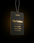 Cruzeno 'The Ember' air freshener tag on a black background