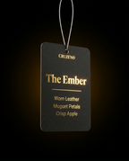 Cruzeno 'The Ember' air freshener tag on a black background