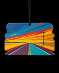A rectangular car air freshener ornament with rounded corners, featuring a colorful graphic of a road stretching into the horizon under a blue, red, and orange sky. The ornament hangs from a black string against a solid black background.