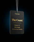 Cruzeno 'The Coast' air freshener tag on a black background